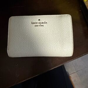 kate spade pebbled leather zip wallet in light gray